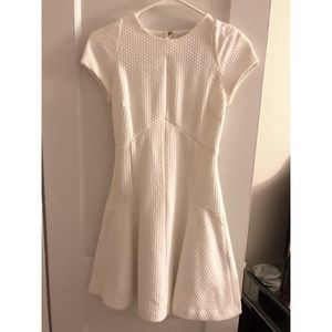 Very flattering & stretchy white cap sleeve dress